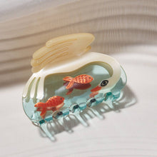Load image into Gallery viewer, Women&#39;s White Swan Hair Claw in Crystal Clear Blue Acetate
