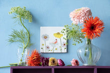 Load image into Gallery viewer, Surrounded by flowers | StoryTiles art on tile
